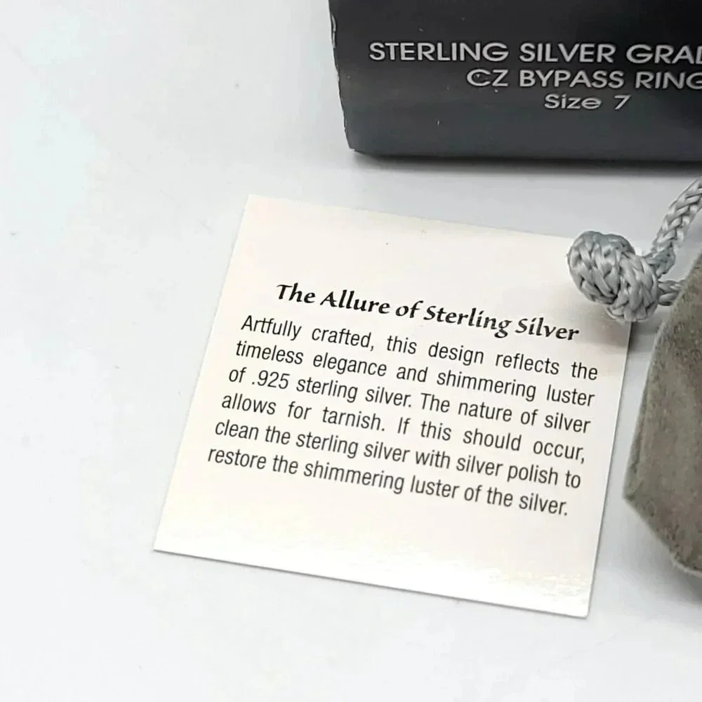 AVON Sterling Silver Graduated CZ Bypass Ring Embellished with CZ Size 7 NIB